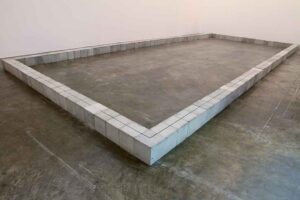 The Nature of a Surrounded Site, 985 x 422 x 20 cm, cement block, 2016